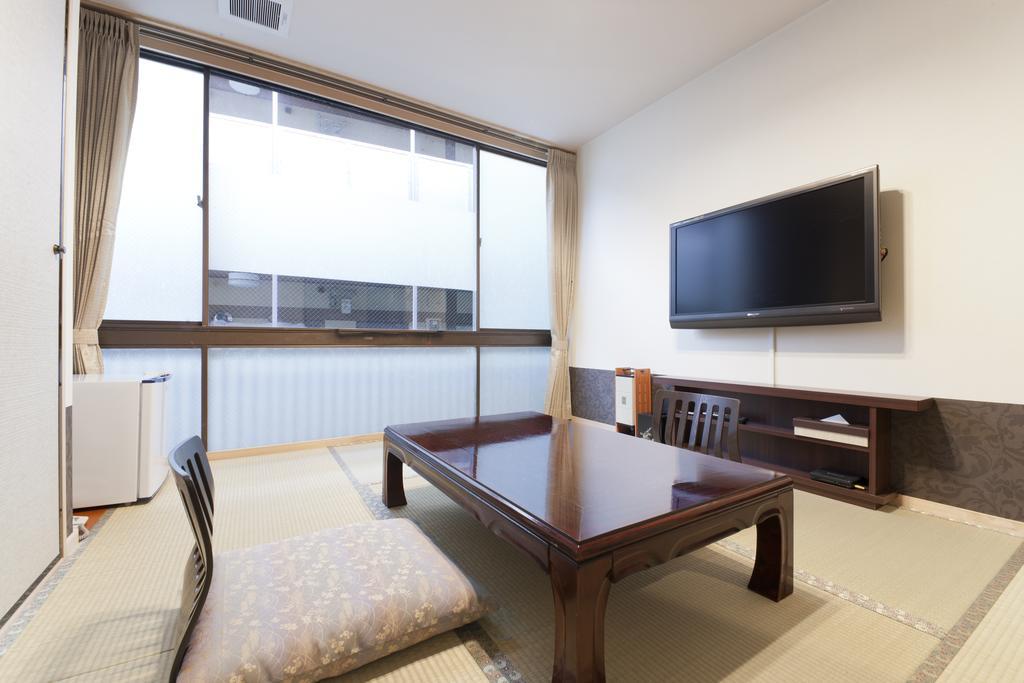 Kikunoya Hotel Hatsukaichi Værelse billede