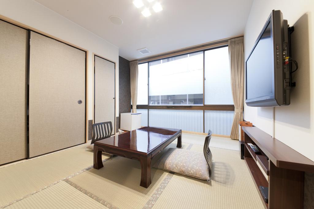 Kikunoya Hotel Hatsukaichi Værelse billede